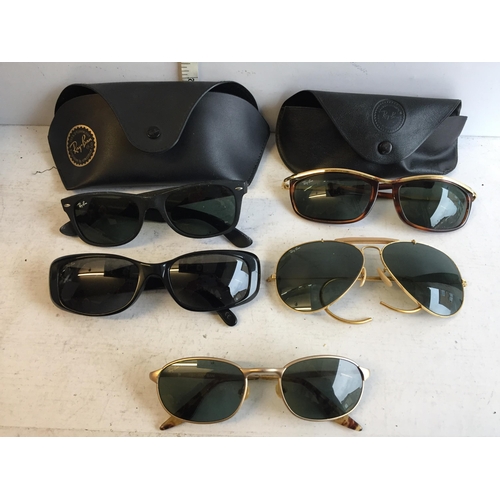 155 - Collection of Designer Ray Ban Sun Glasses Inc Cases.


701331