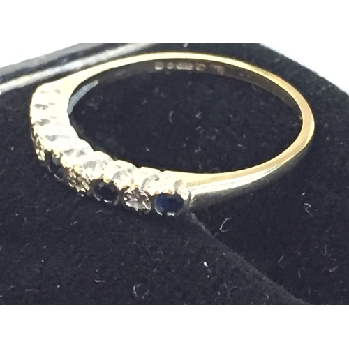 22 - 9ct Gold Sapphire & Diamond Half Eternity Ring, size P 1/2.



2072973