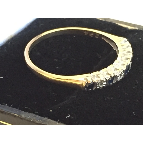 22 - 9ct Gold Sapphire & Diamond Half Eternity Ring, size P 1/2.



2072973