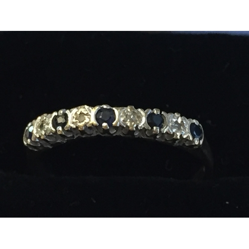 22 - 9ct Gold Sapphire & Diamond Half Eternity Ring, size P 1/2.



2072973