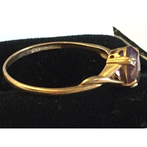 23 - 9ct Gold Amethyst Dress Ring, size S.


2072972