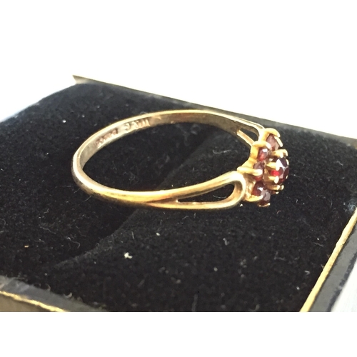 28 - 9ct Gold Garnet Cluster Ring, size M.


2072978