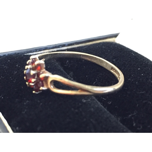 28 - 9ct Gold Garnet Cluster Ring, size M.


2072978