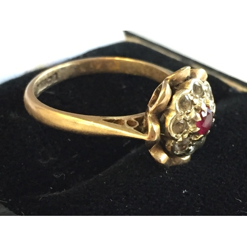 40 - 9ct Gold Ruby & White Gem Stone Cluster Ring, size K 1/2.



2058047