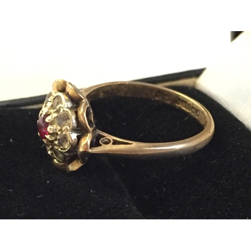 40 - 9ct Gold Ruby & White Gem Stone Cluster Ring, size K 1/2.



2058047