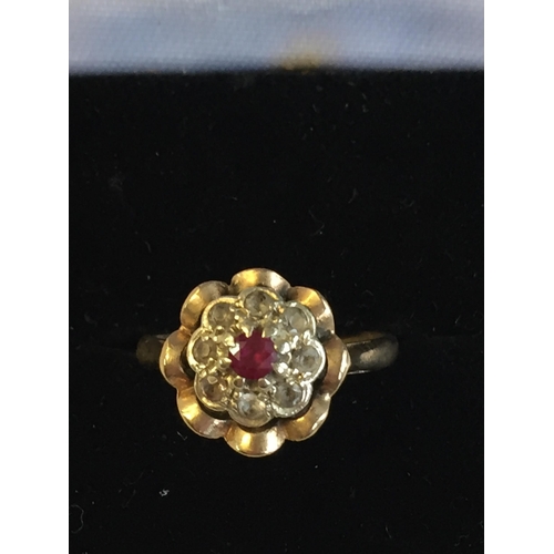 40 - 9ct Gold Ruby & White Gem Stone Cluster Ring, size K 1/2.



2058047