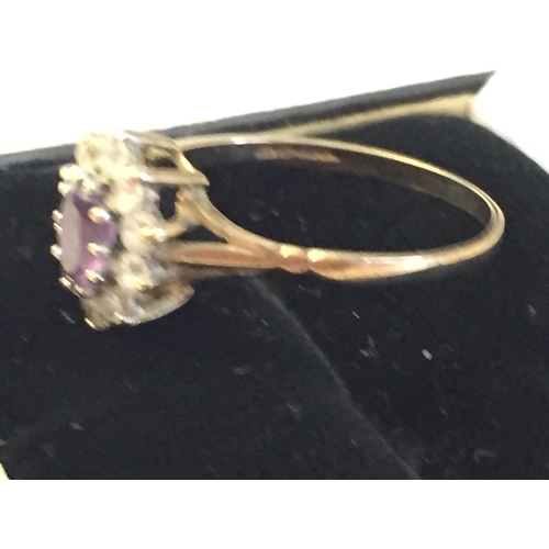 41 - 9ct Gold Amethyst & Cubic Zirconia Cluster Ring, size Q 1/2.


2058058