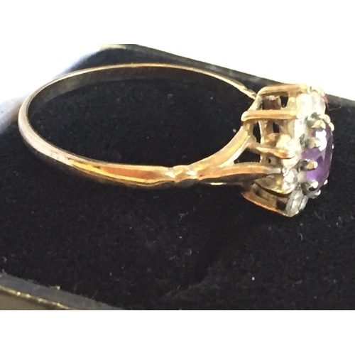 41 - 9ct Gold Amethyst & Cubic Zirconia Cluster Ring, size Q 1/2.


2058058