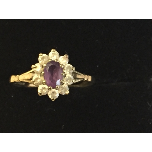 41 - 9ct Gold Amethyst & Cubic Zirconia Cluster Ring, size Q 1/2.


2058058