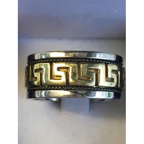 428 - 12.9 grams 14ct Gold Greek Spinner Ring. Size W