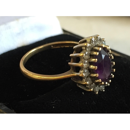 46 - 9ct Gold Amethyst & White Gem Stone Ring, size M.


2052853