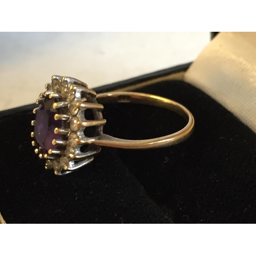 46 - 9ct Gold Amethyst & White Gem Stone Ring, size M.


2052853