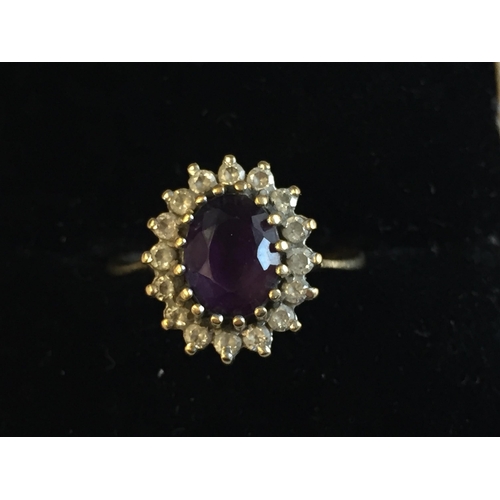 46 - 9ct Gold Amethyst & White Gem Stone Ring, size M.


2052853