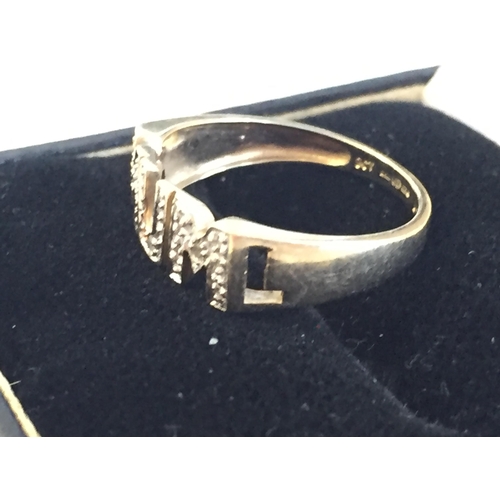 58 - 9ct Gold Diamond Set MUM Ring, size J.



2055409