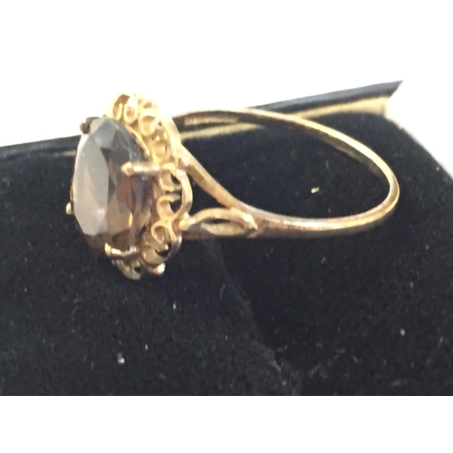 60 - 9ct Gold Smokey Quartz Cocktail Ring, size P.


2055406