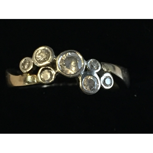 67 - 9ct White & Yellow Gold Cubic Zirconia Bubble Ring, size N 1/2.



2055399