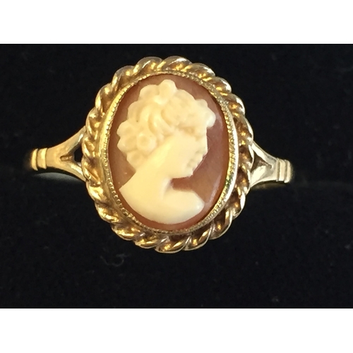 72 - 9ct Gold Carved Shell Cameo Set Dress Ring, size P.



2055410