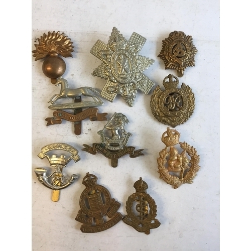 159 - Military Cap Badges Inc West Yorkshire Black Watch x 10.


683809