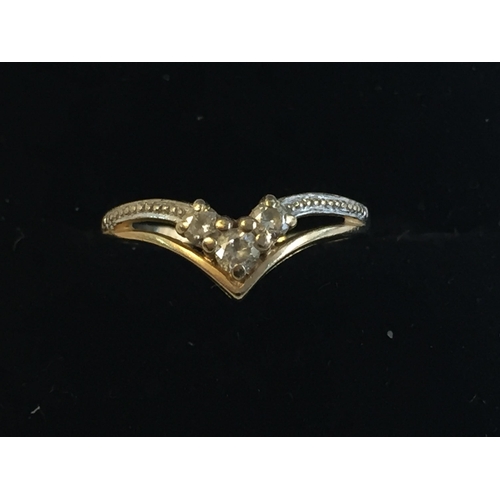 186 - 9ct Gold Cubic Zirconia Set Wishbone Ring, size L 1/2.



2055400