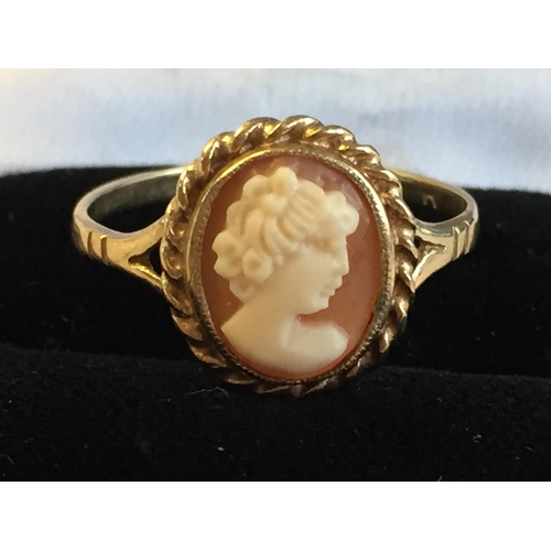 193 - 9ct Gold Carved Shell Cameo Set Dress Ring, size P.



2055410