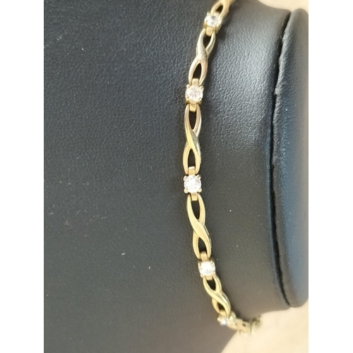 199 - 9ct Gold Cubic Zirconia Bracelet. 

2029538