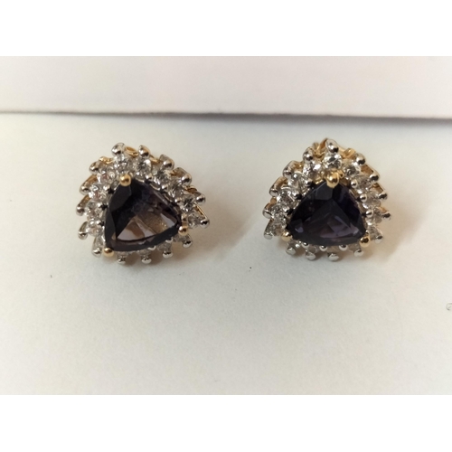 203 - 9ct Gold Iolite & Zircon Stud Earrings.

2058181