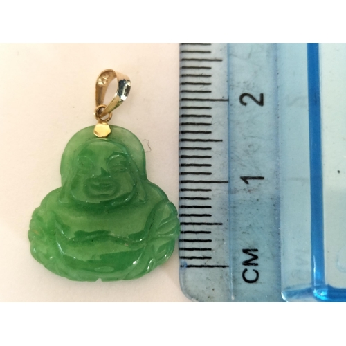 205 - 14ct Gold Jade Carved Buddha Pendant.

2058302