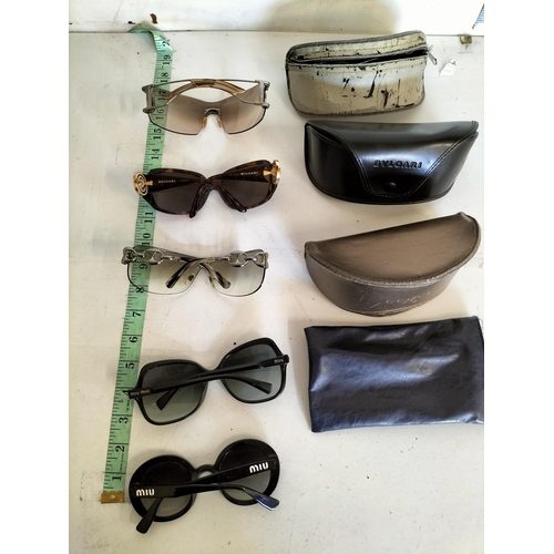 178 - Designer Sun Glasses/Eye Ware Inc Miu Miu, Gucci X 5.
Signs of Wear.

375557