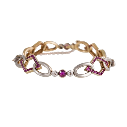 108 - AN ART DECO RUBY AND DIAMOND BRACELET, comprising lozenge shaped ruby panels interspersed with diamo... 