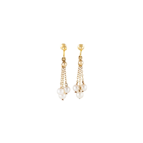 124 - A PAIR OF PEARL DROP EARRINGS, each comprising three pearls suspended from chain links, 18ct yellow ... 