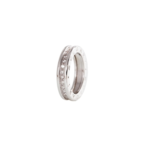 130 - A BULGARI B - ZERO RING, set with brilliant cut diamonds, mounted in 18ct white gold, size L - M