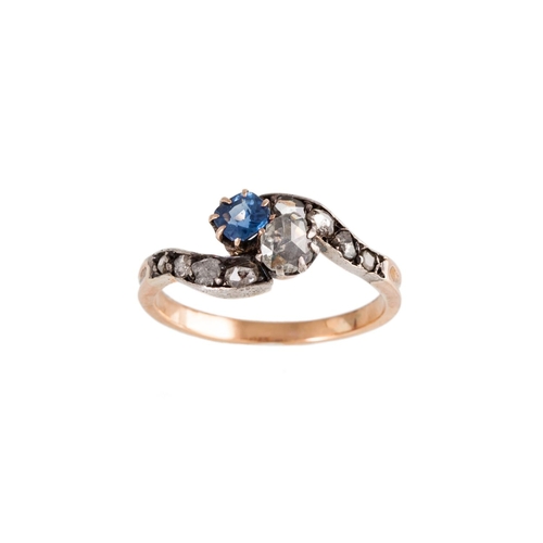 139 - AN ANTIQUE DIAMOND AND SAPPHIRE TWO STONE RING, set with a circular sapphire and a rose cut diamond,... 