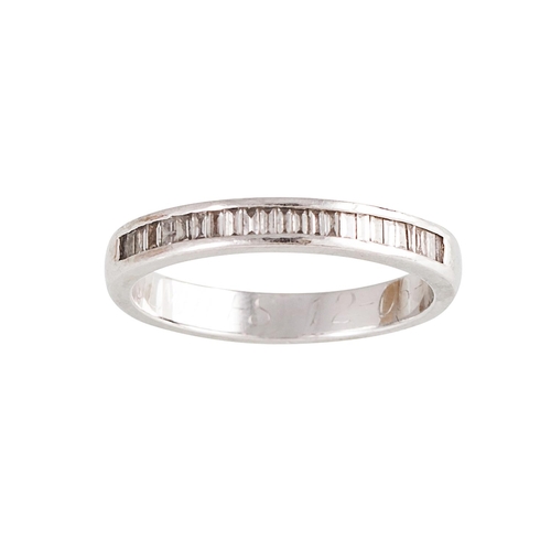 159 - A DIAMOND HALF ETERNITY RING, set with baguette cut diamonds, mounted in platinum. Estimated; weight... 