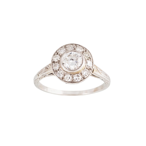 162 - AN ANTIQUE DIAMOND CLUSTER RING, c. 1915, of circular form, set with old cut diamonds, mounted in wh... 