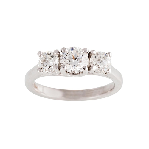 170 - A THREE STONE DIAMOND RING, the brilliant cut diamonds mounted in 18ct white gold. Estimated; weight... 