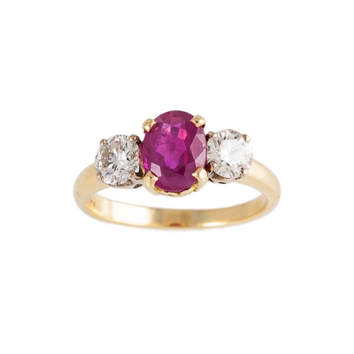 171 - A RUBY AND DIAMOND CLUSTER RING, the oval ruby to a brilliant cut diamond surround, mounted in 18ct ... 