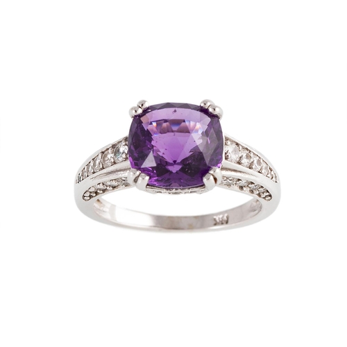 172 - AN AMETHYST AND DIAMOND DRESS RING, the mixed cut amethyst to diamond shoulders and mount, mounted i... 