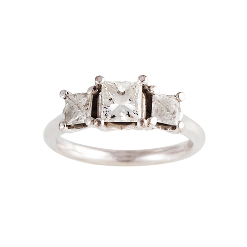 173 - A THREE STONE DIAMOND RING, the princess cut diamonds mounted in 18ct white gold. Estimated; weight ... 