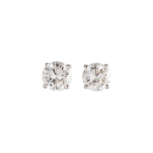 51 - A PAIR OF DIAMOND STUD EARRINGS, the brilliant cut diamonds mounted in yellow gold. Estimated; weigh... 