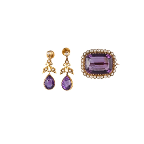 540 - AN ANTIQUE AMETHYST AND PEARL BROOCH, the rectangular amethyst to a seed pearl surround, gold framed... 