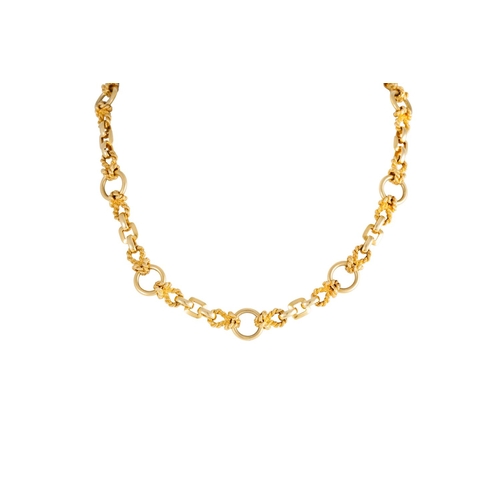 57 - AN HERMES GOLD COLLAR NECKLACE, comprising knotted links interspersed with circular and square links... 