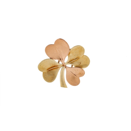 60 - A VINTAGE CARTIER TWO COLOUR GOLD PIN, modelled as a four leafed clover, signed Cartier, 14ct for ye... 