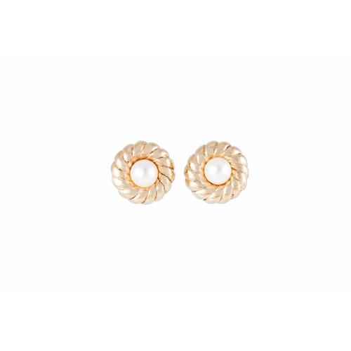 69 - A PAIR OF CULTURED PEARL EARRINGS, the central pearls to 9ct yellow gold fluted circular surrounds