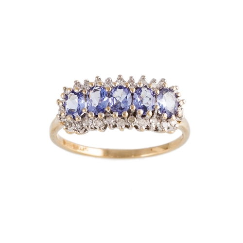 81 - A TANZANITE AND DIAMOND DRESS RING, the five oval tanzanites to a diamond border, mounted in 9ct yel... 