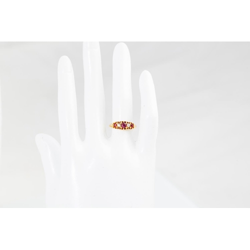 121 - AN ANTIQUE FIVE STONE DIAMOND AND RUBY RING, set with old cut stones, mounted in 18ct yellow gold. s... 