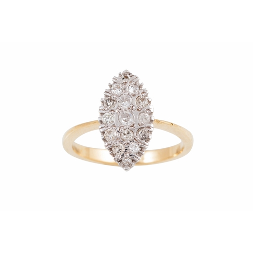 24 - A DIAMOND SET RING, boat shaped, set with circular diamonds, mounted in 18ct yellow gold. Estimated;... 