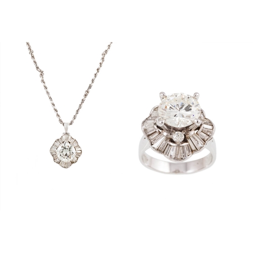 37 - A DIAMOND SOLITAIRE RING/ PENDANT, the round brilliant cut diamond mounted in 18ct white gold combin... 