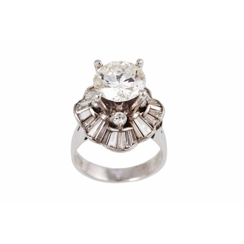 37 - A DIAMOND SOLITAIRE RING/ PENDANT, the round brilliant cut diamond mounted in 18ct white gold combin... 