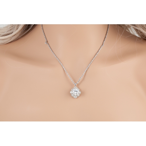37 - A DIAMOND SOLITAIRE RING/ PENDANT, the round brilliant cut diamond mounted in 18ct white gold combin... 