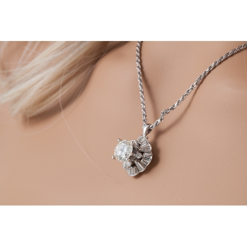 37 - A DIAMOND SOLITAIRE RING/ PENDANT, the round brilliant cut diamond mounted in 18ct white gold combin... 